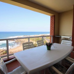 On the Margate seafront South Coast of KZN is Balooga 8. A 7 sleeper lovely seaviews - Patio - Happy Holiday Homes