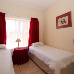 On the Margate seafront South Coast of KZN is Balooga 8. A 7 sleeper lovely seaviews - 2nd Bedroom - Happy Holiday Homes