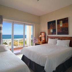 On the Margate seafront South Coast of KZN is Balooga 8. A 7 sleeper lovely seaviews - 2nd Bedroom - Happy Holiday Homes