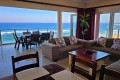 Lucien Sands 601 is a self-catering penthouse on the beach in Manaba on the south coast of KwaZulu Natal with a 180 degree panoramic breaker sea view - Happy Holiday Homes
