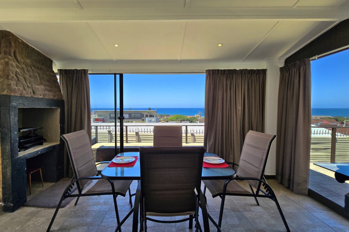 Enjoy an air-conditioned holiday close to Shelly Centre and MacDonalds at Isles of Shelly 8 a 5 sleeper simplex in Shelly Beach with sea views, WIFI internet, a charcoal braai, and all the comforts of home.