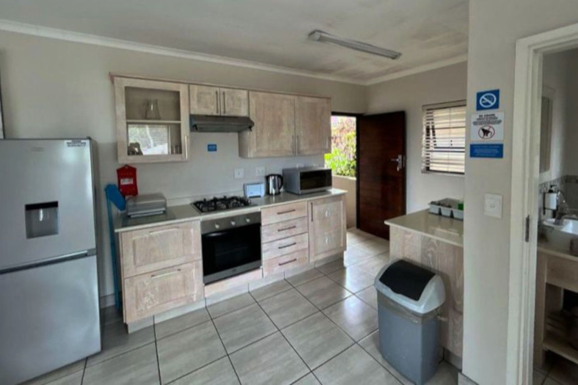 Banana Beach Club F1, a self-catering ground-floor studio in Melville on the Hibiscus Coast, located 50m from the beach, ideal for a small family holiday.