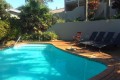 Banana Beach Club F1, a self-catering ground-floor studio in Melville on the Hibiscus Coast, located 50m from the beach, ideal for a small family holiday.