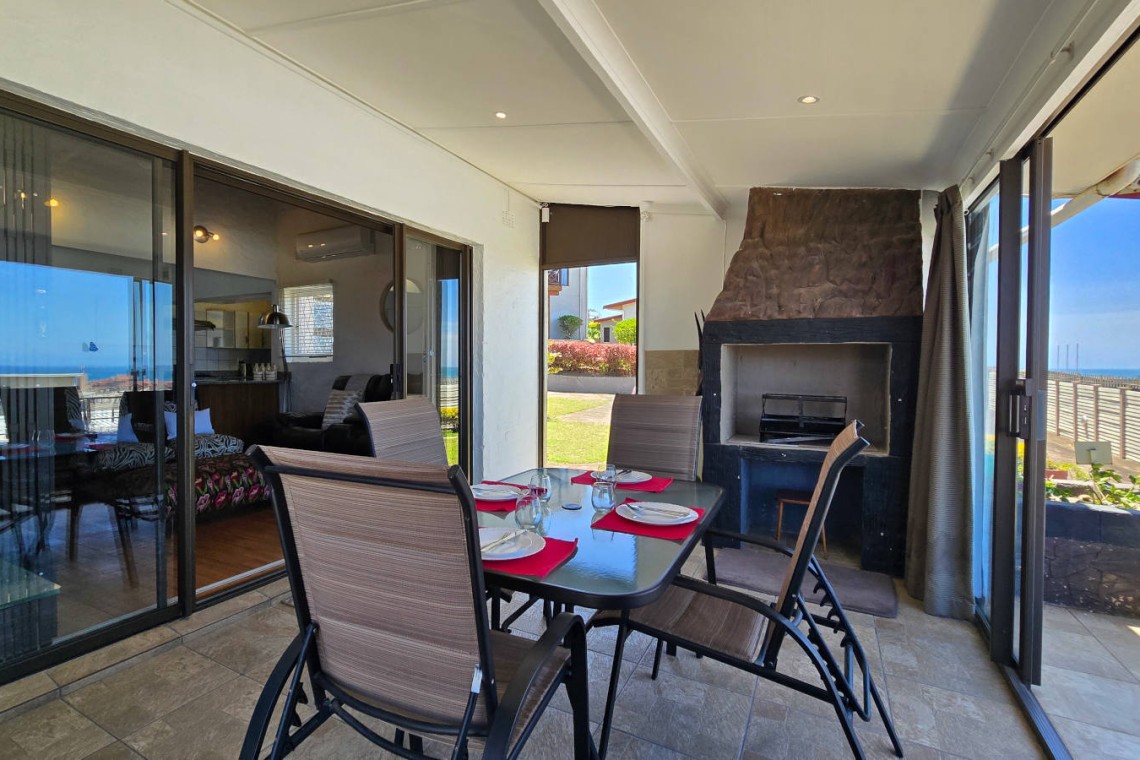 Holiday at Isles of Shelly 8 in Shelly Beach a 5 sleeper simplex and enjoy an air-conditioned holiday close to Shelly Centre and MacDonald's with relaxing sea views, a braai, and all the comforts of home.