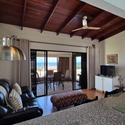 Holiday at Isles of Shelly 8 in Shelly Beach a 5 sleeper simplex and enjoy an air-conditioned holiday close to Shelly Centre and MacDonald's with relaxing sea views, a braai, and all the comforts of home.