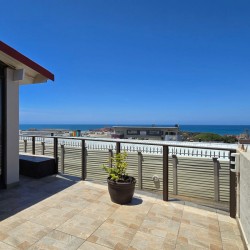 Holiday at Isles of Shelly 8 in Shelly Beach a 5 sleeper simplex and enjoy an air-conditioned holiday close to Shelly Centre and MacDonald's with relaxing sea views, a braai, and all the comforts of home.