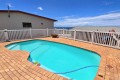 Holiday at Isles of Shelly 8 in Shelly Beach a 5 sleeper simplex and enjoy an air-conditioned holiday close to Shelly Centre and MacDonald's with relaxing sea views, a braai, and all the comforts of home.