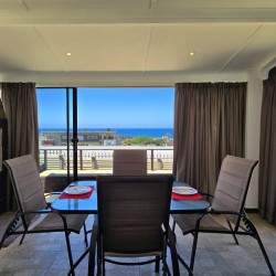 Holiday at Isles of Shelly 8 in Shelly Beach a 5 sleeper simplex and enjoy an air-conditioned holiday close to Shelly Centre and MacDonald's with relaxing sea views, a braai, and all the comforts of home.