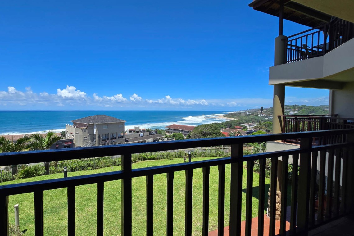 Stay at Kuta Beach 17 Ramsgate, a stunning 4-bedroom, 8-sleeper self-catering holiday apartment KZN with sea views, Wi-Fi, pool, and Smart TV.