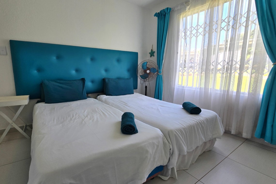 Laguna la Crete 102 in Uvongo is a holiday rental beachfront apartment offering self-catering family-friendly holiday accommodation on the South Coast of KwaZulu Natal