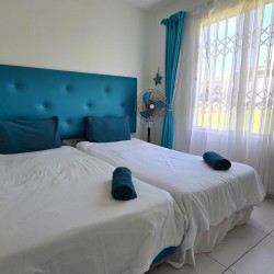 Laguna la Crete 102 in Uvongo is a holiday rental beachfront apartment offering self-catering family-friendly holiday accommodation on the South Coast of KwaZulu Natal