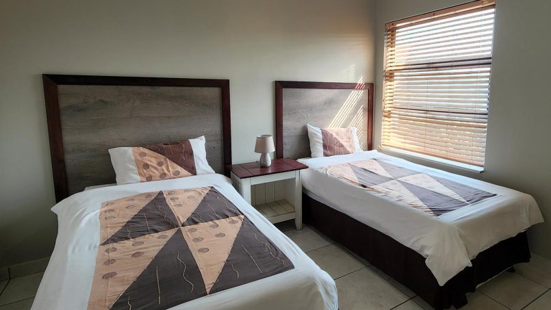 Third bedroom with twin beds at Indigo Bay 25 Lucien Beach