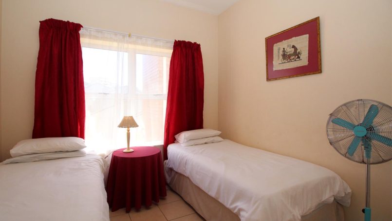 On the Margate seafront South Coast of KZN is Balooga 8. A 7 sleeper lovely seaviews - 2nd Bedroom - Happy Holiday Homes