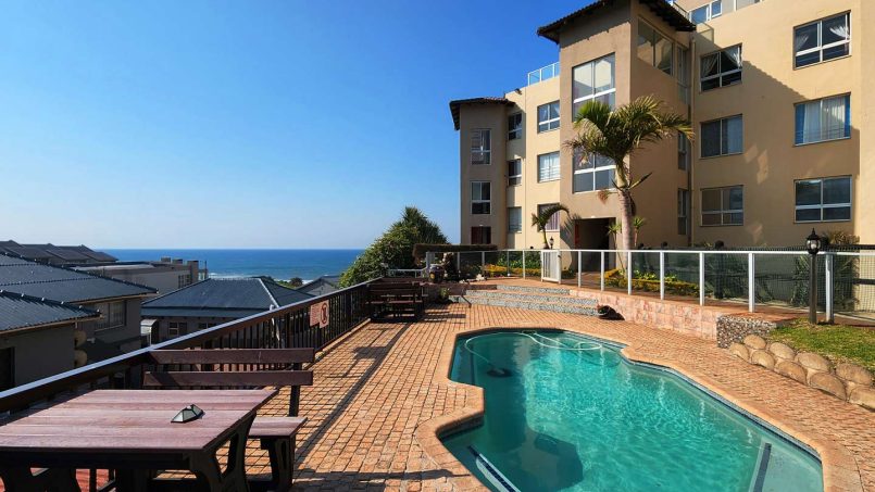 Exterior and pool of Don Juan 2 beachfront apartment block on the Margate seafront