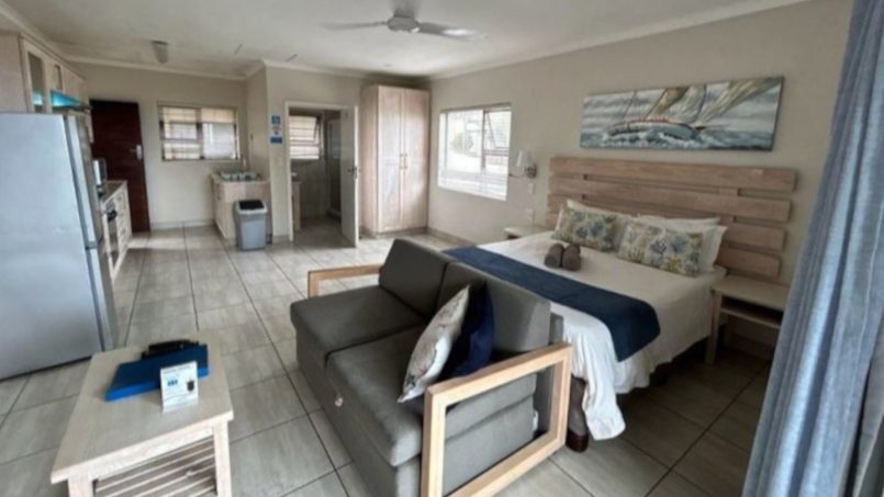 Banana Beach Club F1, a self-catering ground-floor studio in Melville on the Hibiscus Coast, located 50m from the beach, ideal for a small family holiday.