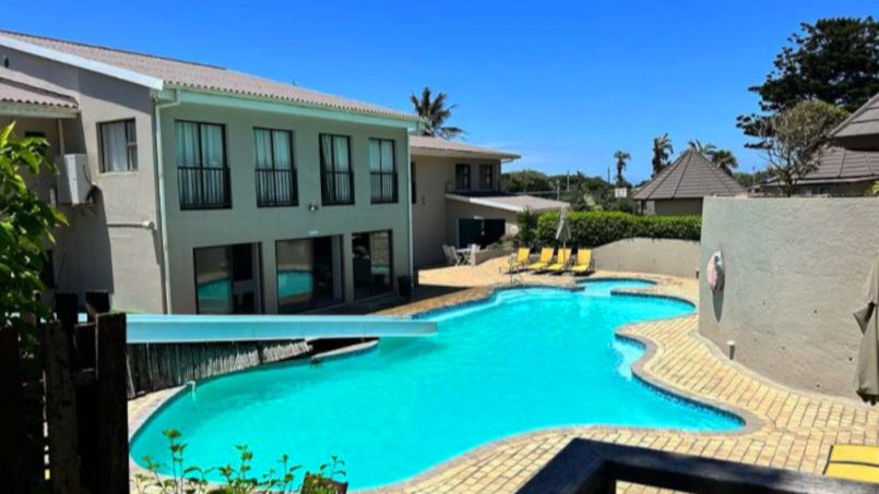 Banana Beach Club F1, a self-catering ground-floor studio in Melville on the Hibiscus Coast, located 50m from the beach, ideal for a small family holiday.