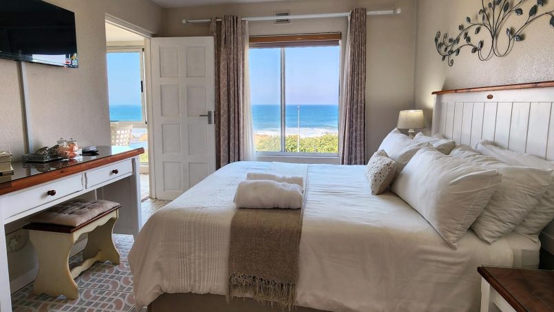 Main bedroom at Don Juan 2 Margate with queen bed, sea view and ensuite bathroom