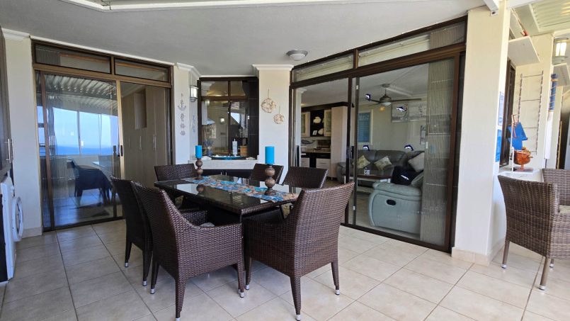 The dining area on the enclosed patio at Chardonnay Cabanas 5