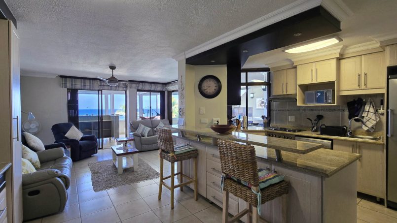 Open plan lounge with sea view at Chardonnay Cabanas 5