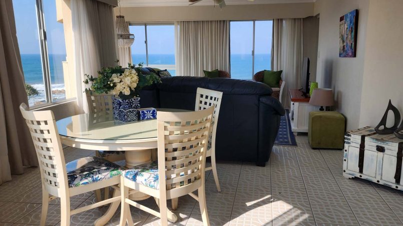 Comfortable family lounge at Don Juan 2, Margate, with sea view balcony on the beachfront