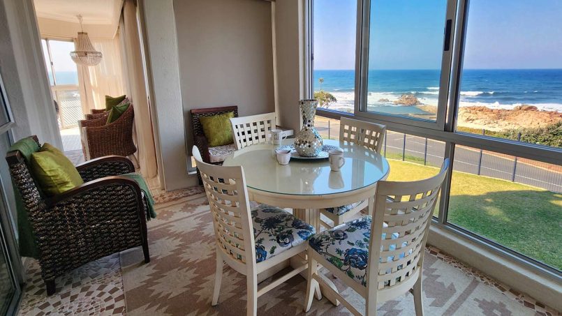 Comfortable family lounge at Don Juan 2, Margate, with sea view balcony on the beachfront