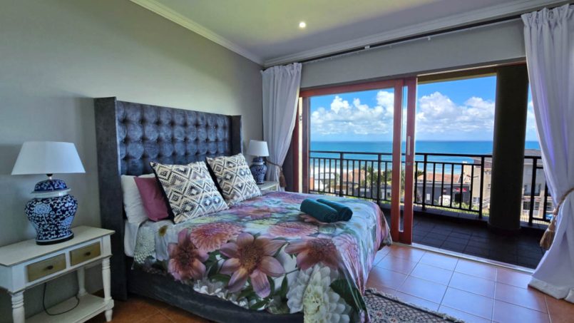 Stay at Kuta Beach 17 Ramsgate, a stunning 4-bedroom, 8-sleeper self-catering holiday apartment KZN with sea views, Wi-Fi, pool, and Smart TV.