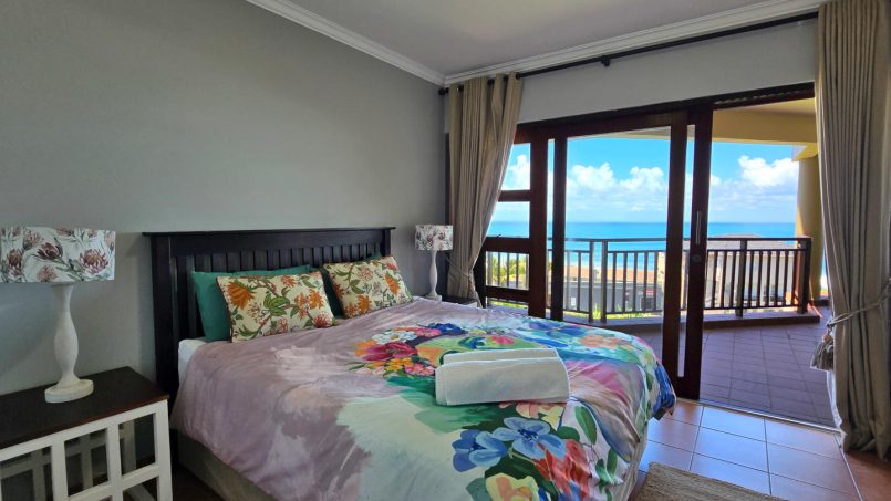 Stay at Kuta Beach 17 Ramsgate, a stunning 4-bedroom, 8-sleeper self-catering holiday apartment KZN with sea views, Wi-Fi, pool, and Smart TV.