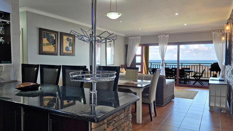 Stay at Kuta Beach 17 Ramsgate, a stunning 4-bedroom, 8-sleeper self-catering holiday apartment KZN with sea views, Wi-Fi, pool, and Smart TV.