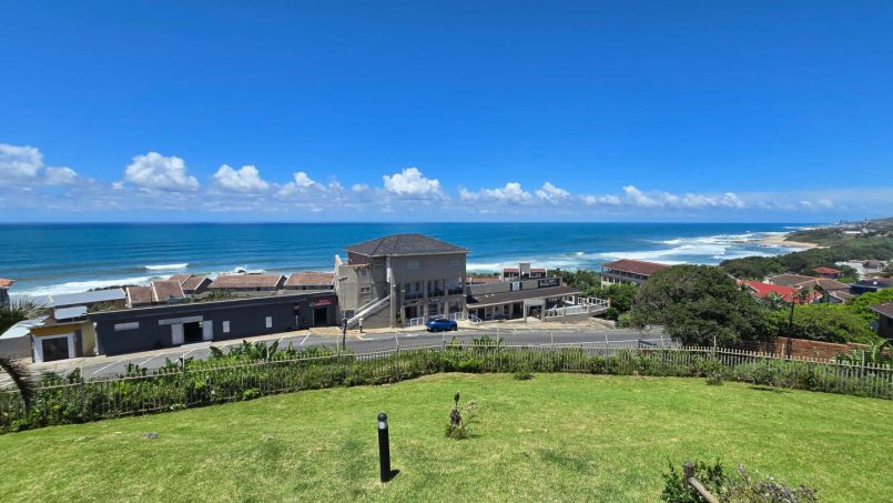 Stay at Kuta Beach 17 Ramsgate, a stunning 4-bedroom, 8-sleeper self-catering holiday apartment KZN with sea views, Wi-Fi, pool, and Smart TV.