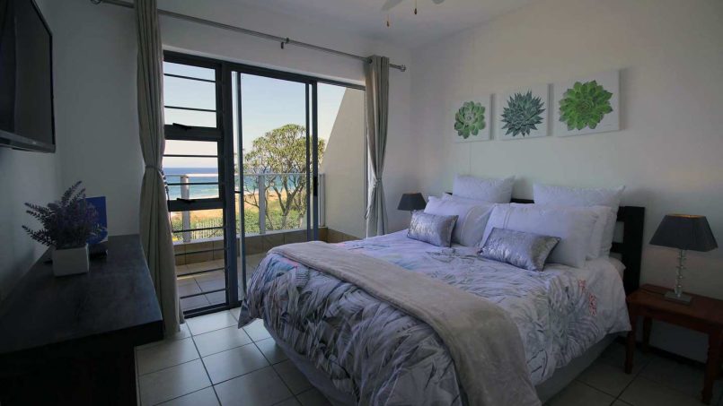 Main bedroom with double bed and sea view at Chesapeake Bay 22 Margate beachfront holiday apartment