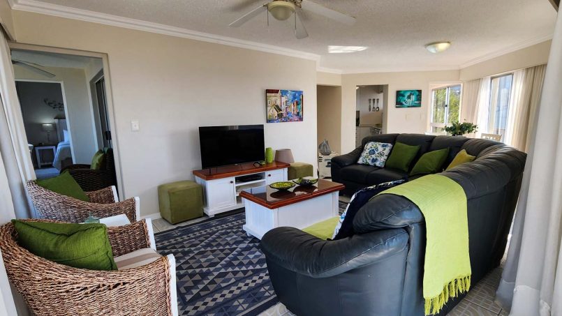 Comfortable family open plan lounge at Don Juan 2, Margate, with sea view balcony on the beachfront