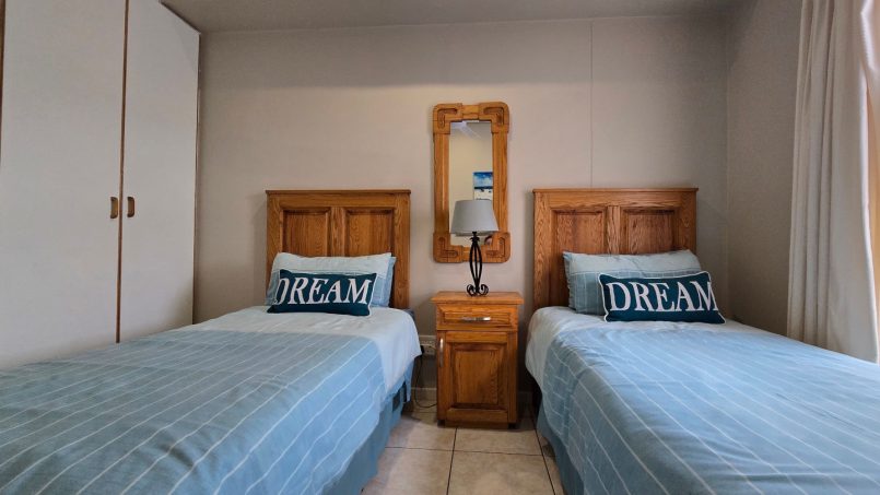 The 2nd bedroom at Portofino 15 in Shelly Beach is perfect for the kids with two single beds.