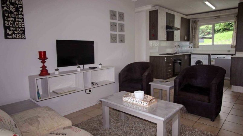 Open plan lounge with ocean views at Ramsgate Palms 76 self-catering apartment