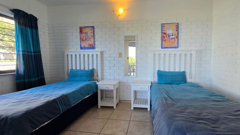 Second bedroom – 2 single beds at Southcoast Seaview @ No 3 Bonamic in Manaba Beach