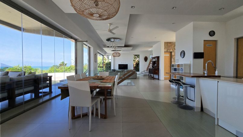 Strachan 2127 is a luxury holiday home in Ramsgate, located on the beachfront of Ramsgate Beach. This stunning sea-view rental in KwaZulu-Natal offers breathtaking ocean views, an infinity pool, and modern comforts—making it the perfect family-friendly getaway in South Africa.