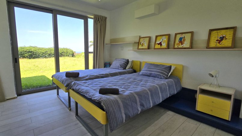 Strachan 2127 is a luxury holiday home in Ramsgate, located on the beachfront of Ramsgate Beach. This stunning sea-view rental in KwaZulu-Natal offers breathtaking ocean views, an infinity pool, and modern comforts—making it the perfect family-friendly getaway in South Africa.