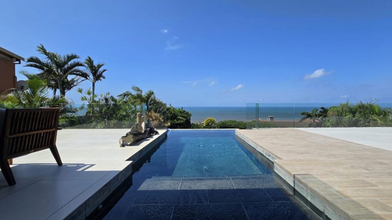 Strachan 2127 is a luxury holiday home in Ramsgate, located on the beachfront of Ramsgate Beach. This stunning sea-view rental in KwaZulu-Natal offers breathtaking ocean views, an infinity pool, and modern comforts—making it the perfect family-friendly getaway in South Africa.