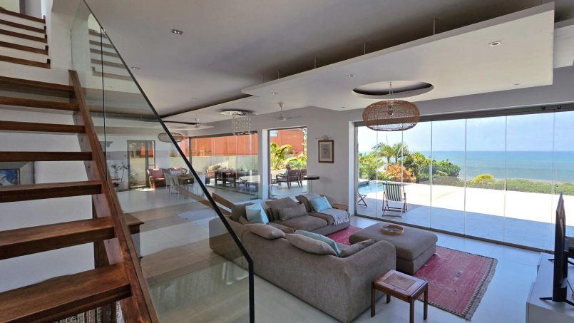 Strachan 2127 is a luxury holiday home in Ramsgate, located on the beachfront of Ramsgate Beach. This stunning sea-view rental in KwaZulu-Natal offers breathtaking ocean views, an infinity pool, and modern comforts—making it the perfect family-friendly getaway in South Africa.