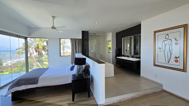 Strachan 2127 is a luxury holiday home in Ramsgate, located on the beachfront of Ramsgate Beach. This stunning sea-view rental in KwaZulu-Natal offers breathtaking ocean views, an infinity pool, and modern comforts—making it the perfect family-friendly getaway in South Africa.