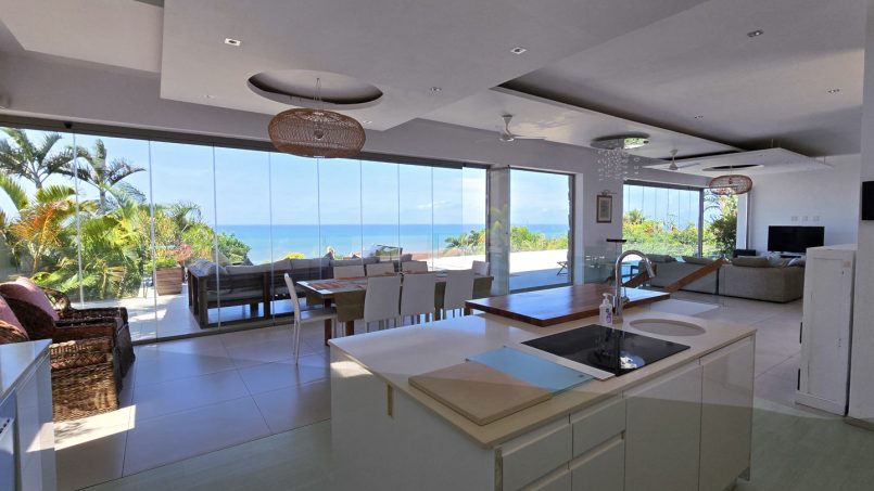 Strachan 2127 is a luxury holiday home in Ramsgate, located on the beachfront of Ramsgate Beach. This stunning sea-view rental in KwaZulu-Natal offers breathtaking ocean views, an infinity pool, and modern comforts—making it the perfect family-friendly getaway in South Africa.