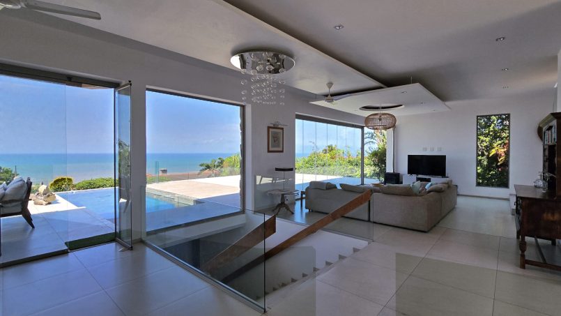 Strachan 2127 is a luxury holiday home in Ramsgate, located on the beachfront of Ramsgate Beach. This stunning sea-view rental in KwaZulu-Natal offers breathtaking ocean views, an infinity pool, and modern comforts—making it the perfect family-friendly getaway in South Africa.