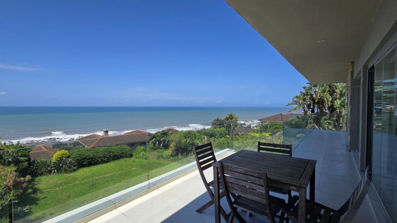 Strachan 2127 is a luxury holiday home in Ramsgate, located on the beachfront of Ramsgate Beach. This stunning sea-view rental in KwaZulu-Natal offers breathtaking ocean views, an infinity pool, and modern comforts—making it the perfect family-friendly getaway in South Africa.