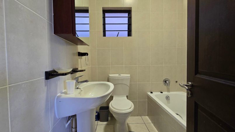 Second bathroom at Topanga 25, a spacious beachfront holiday rental in Uvongo perfect for families seeking comfort and convenience close to Uvongo beach.
