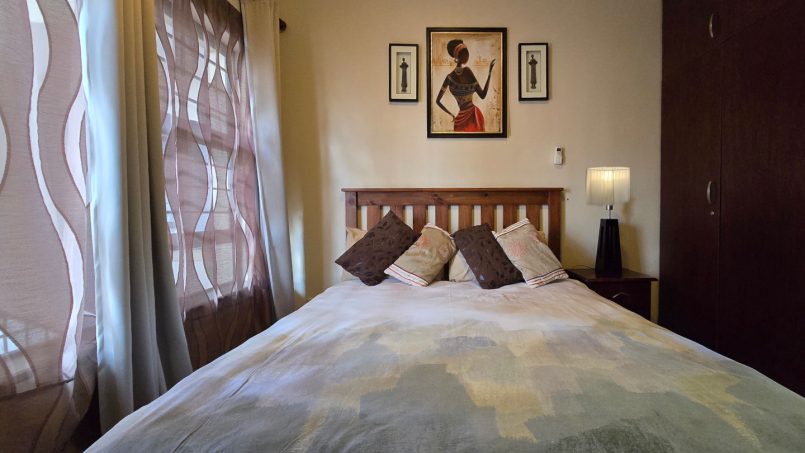 The comfortable 2nd bedroom at Topanga 25, a beachfront holiday rental in Uvongo perfect for families seeking affordable holiday accommodation in Uvongo.