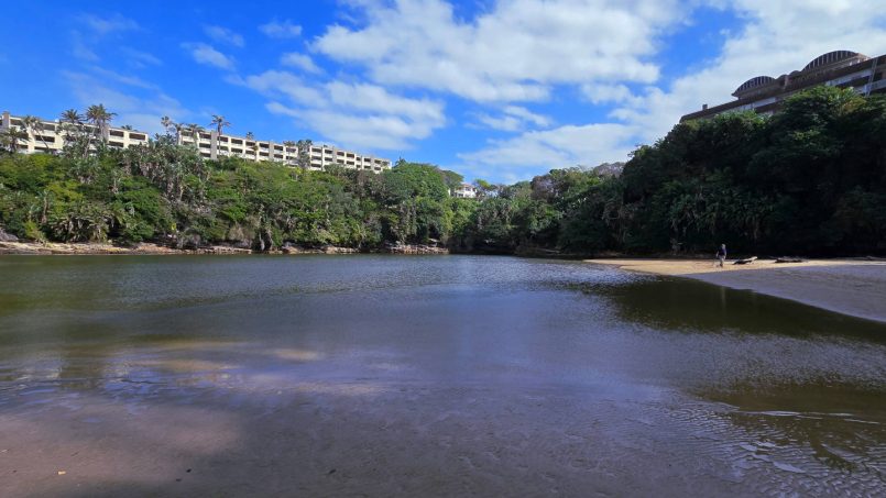 Calm lagoon with sandy beach near Chardonnay Cabanas 5 on Uvongo Beach