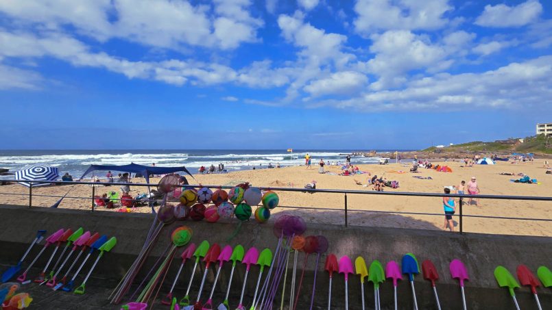 Holiday makers sunning on Uvongo Beach just steps from Chardonnay Cabanas 5