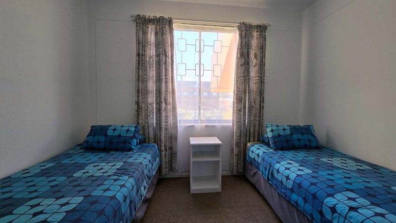 he third bedroom at Margate Sun 11 with twin beds for family stays near Margate Beach